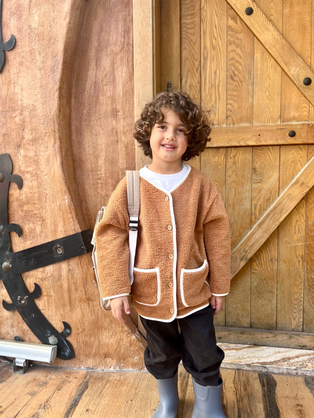 Tan childrenswear jacket with fleece trim