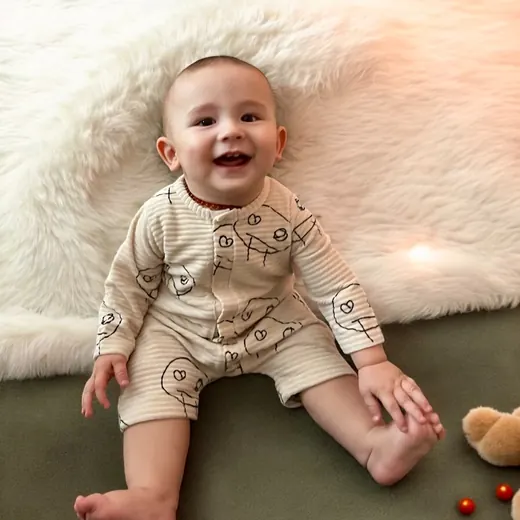Beige printed babywear top and shorts set