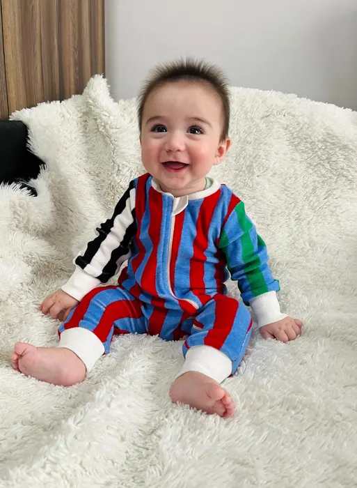 Colourful striped zip-front babywear romper