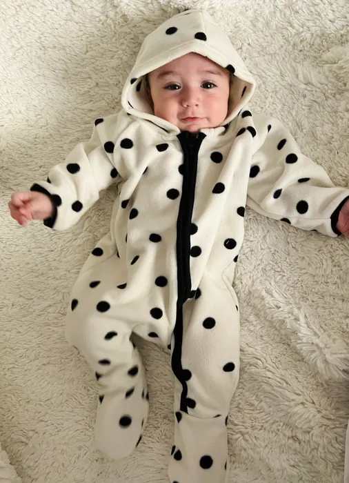 White padded babywear outerwear romper with black spots