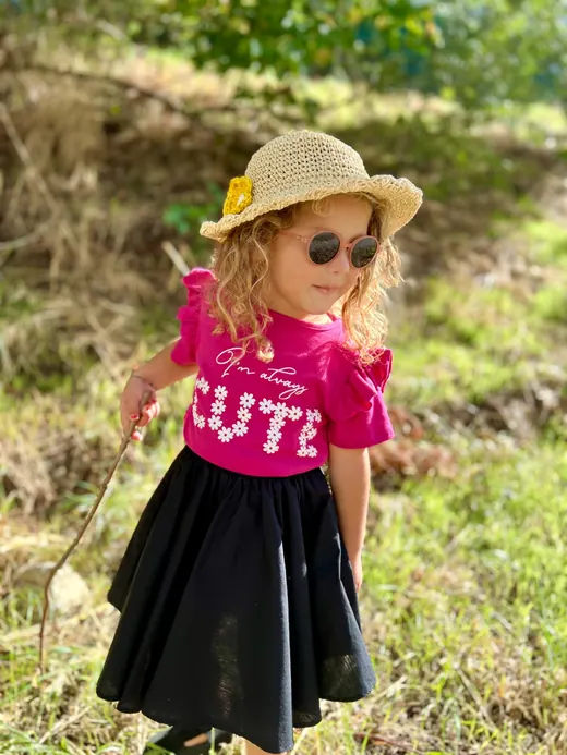 Pink printed childrenswear T-shirt with black skirt