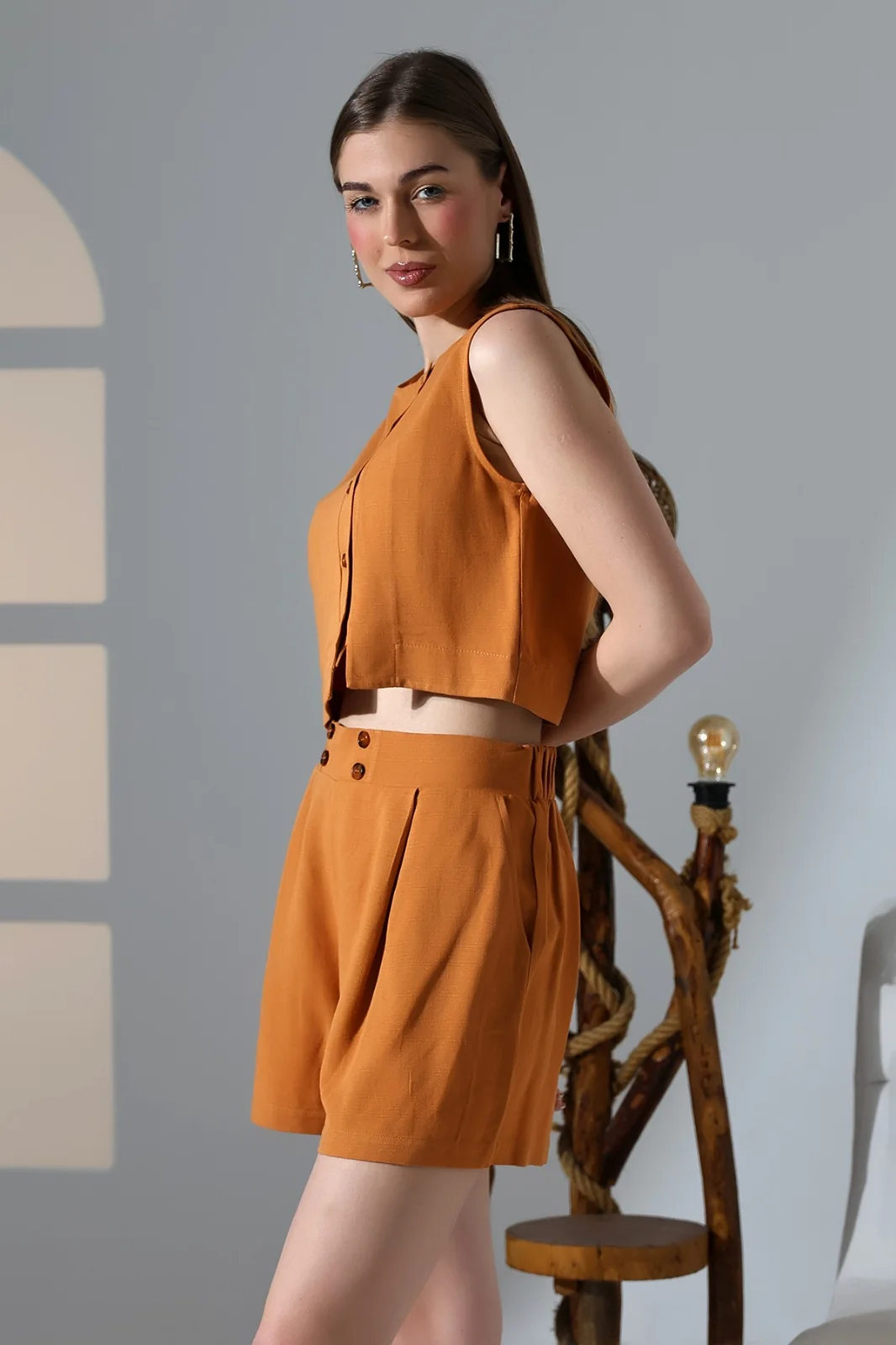 Rust sleeveless womenswear top and shorts set