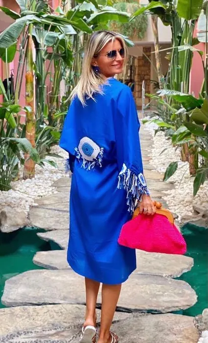 Cobalt blue womenswear dress with fringed sleeves
