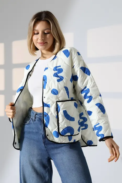 White womenswear jacket with blue print