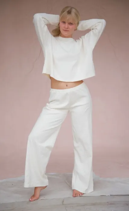White crop top and womenswear trousers set