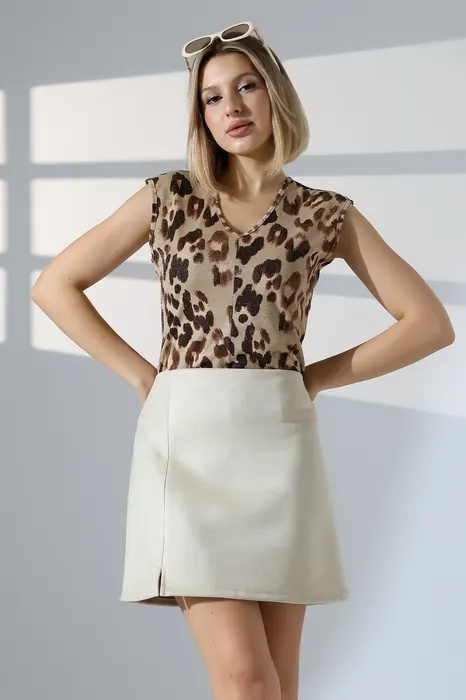 Leopard-print womenswear top with white skirt