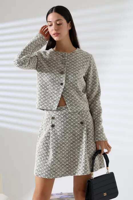 Grey patterned womenswear cardigan and skirt set