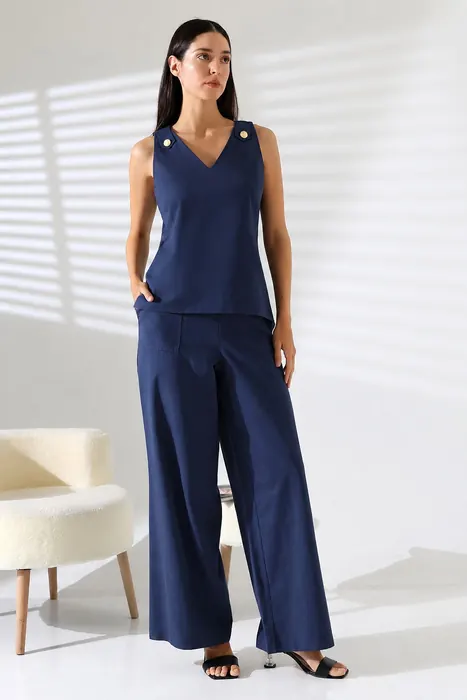 Navy sleeveless womenswear top and wide-leg trousers set